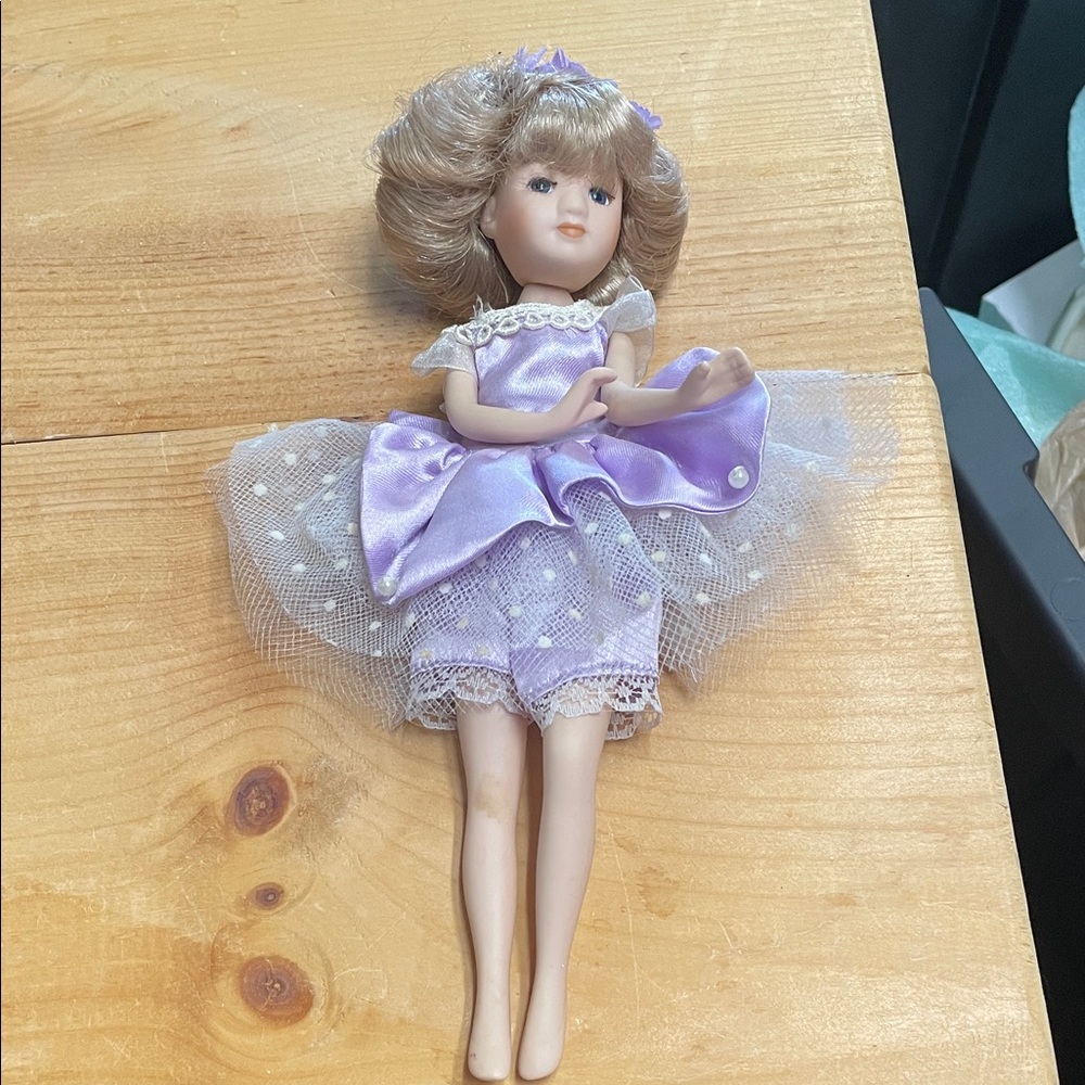 Purple Dress Porcelain Doll